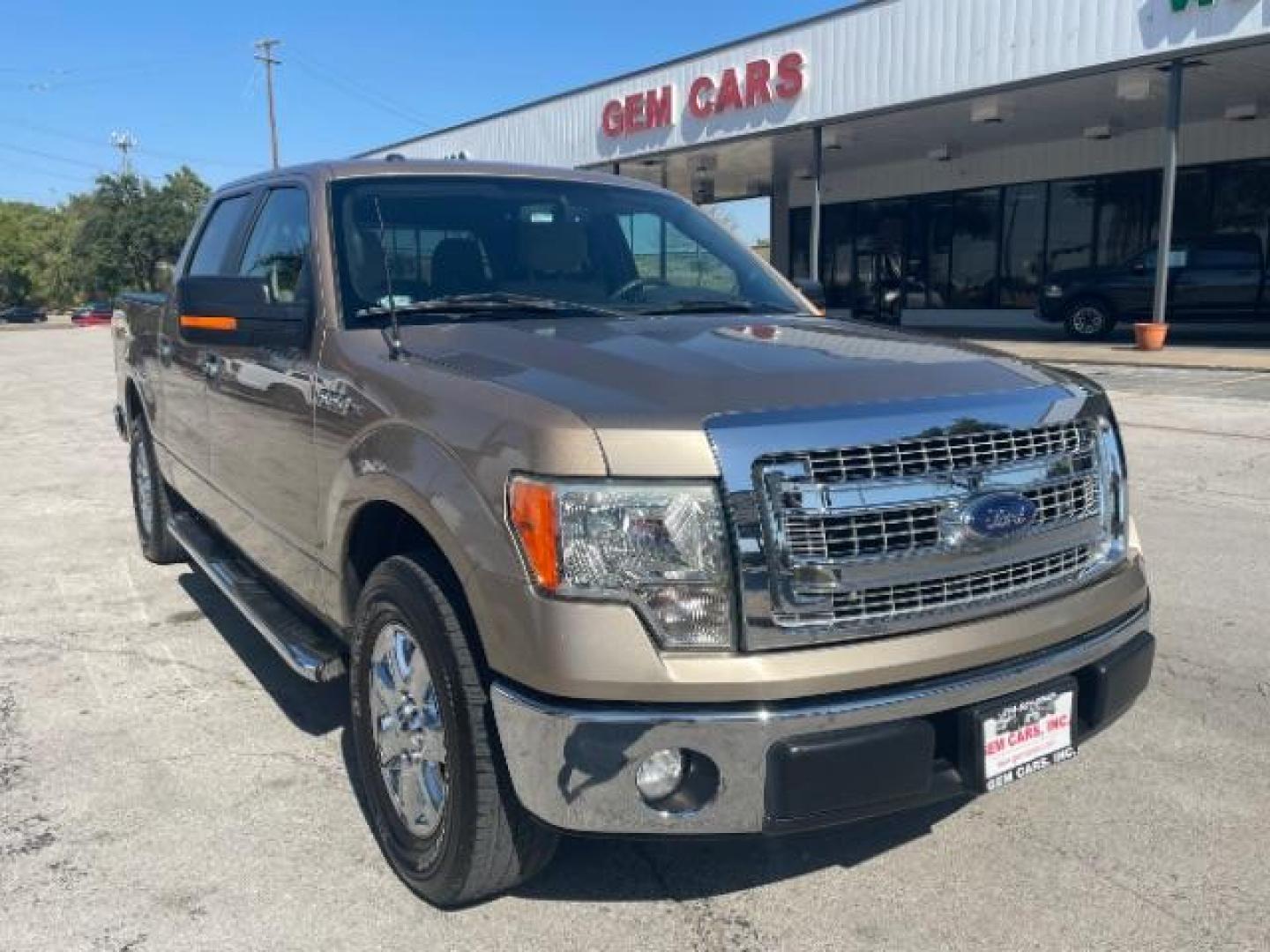 2013 GOLD Ford F-150 XLT SuperCrew 5.5-ft. Bed 2WD (1FTFW1CF7DK) with an 5.0L V8 engine, 6-Speed Automatic transmission, located at 12182 Garland Rd, Dallas, TX, 75218, (214) 521-2040, 0.000000, 0.000000 - Photo#0