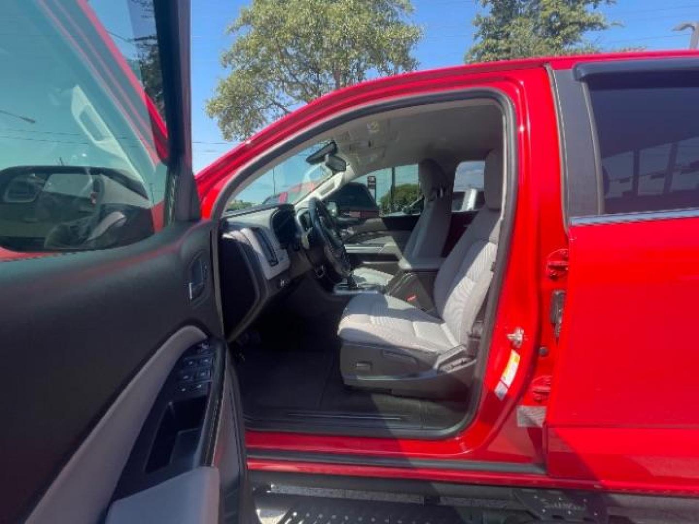 2016 Red Hot Chevrolet Colorado LT Crew Cab 2WD Long Box (1GCGSCE3XG1) with an 3.6L V6 DOHC 24V GAS engine, 6-Speed Automatic transmission, located at 12182 Garland Rd, Dallas, TX, 75218, (214) 521-2040, 0.000000, 0.000000 - Photo#16