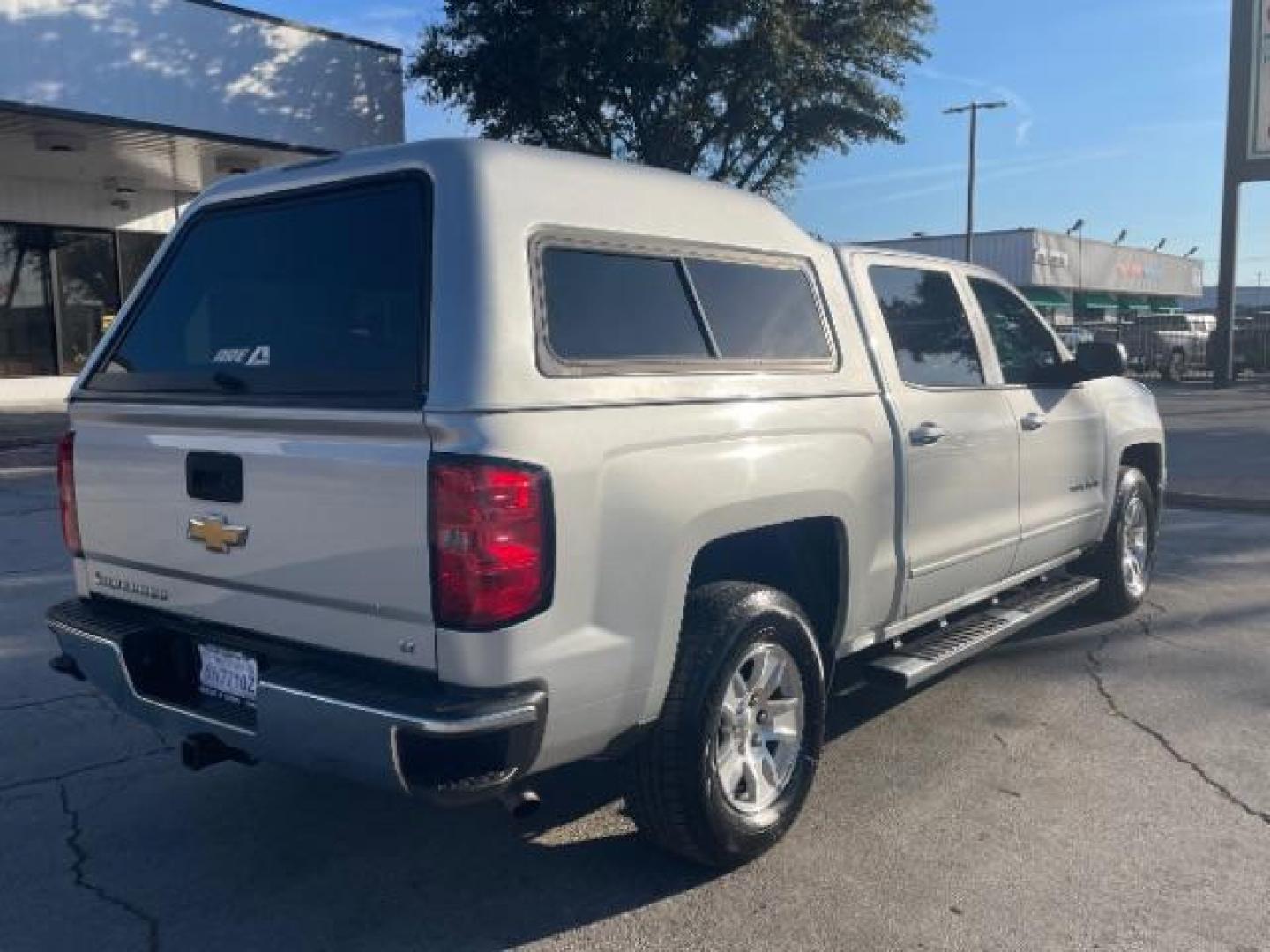 2015 Silver Ice Metallic Chevrolet Silverado 1500 LT Crew Cab 2WD (3GCPCREC1FG) with an 5.3L V8 OHV 16V engine, 6-Speed Automatic transmission, located at 12182 Garland Rd, Dallas, TX, 75218, (214) 521-2040, 0.000000, 0.000000 - Photo#4