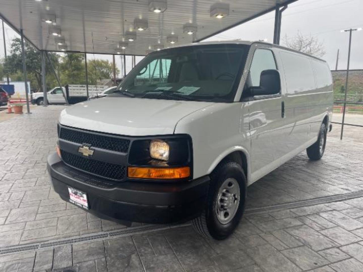 2014 Summit White /Medium Pewter Chevrolet Express 3500 Cargo Extended (1GCZGUCG5E1) with an 6.0L V8 OHV 16V FFV engine, 6-Speed Automatic transmission, located at 12182 Garland Rd, Dallas, TX, 75218, (214) 521-2040, 0.000000, 0.000000 - Photo#2