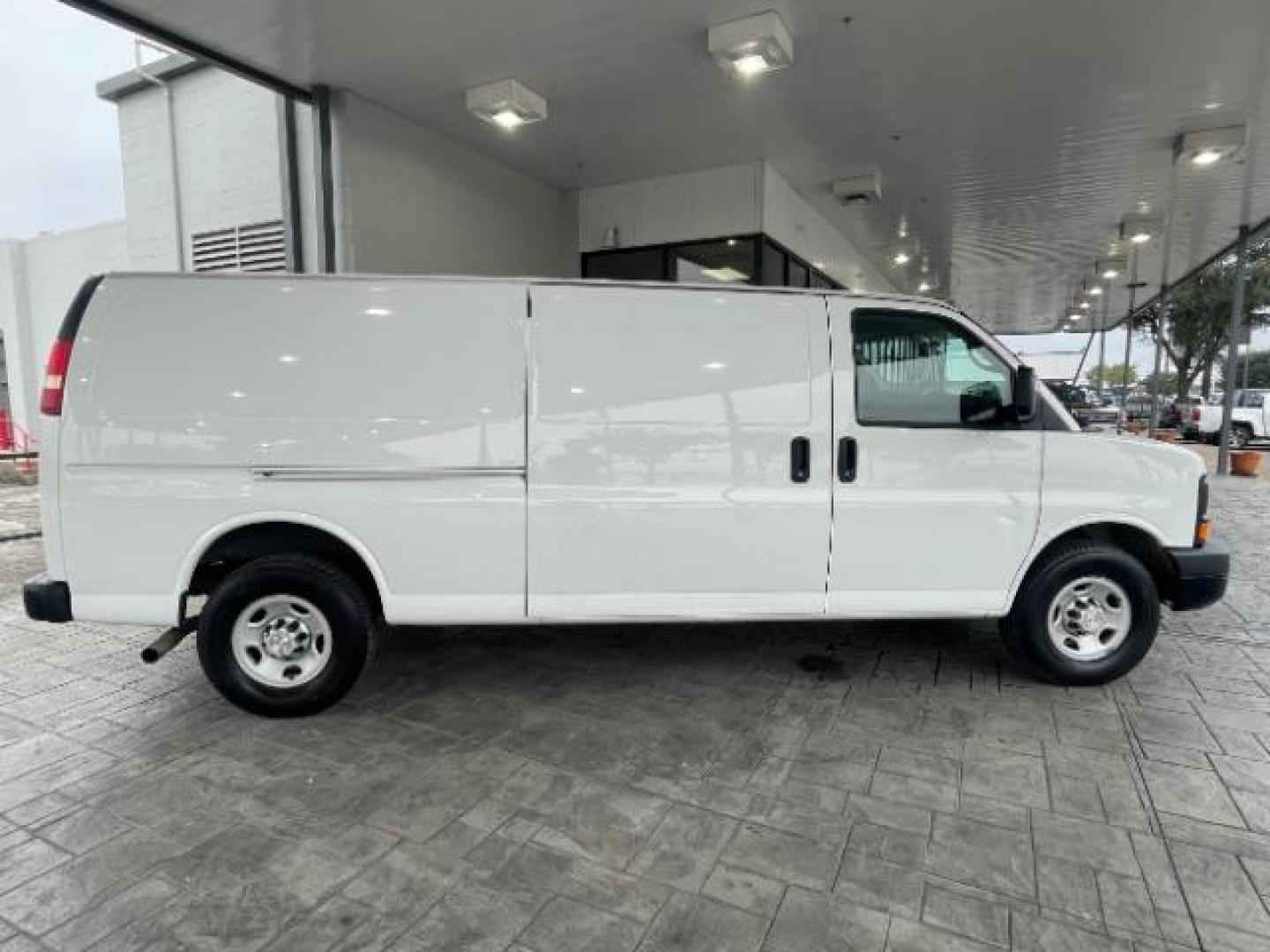 2014 Summit White /Medium Pewter Chevrolet Express 3500 Cargo Extended (1GCZGUCG5E1) with an 6.0L V8 OHV 16V FFV engine, 6-Speed Automatic transmission, located at 12182 Garland Rd, Dallas, TX, 75218, (214) 521-2040, 0.000000, 0.000000 - Photo#5