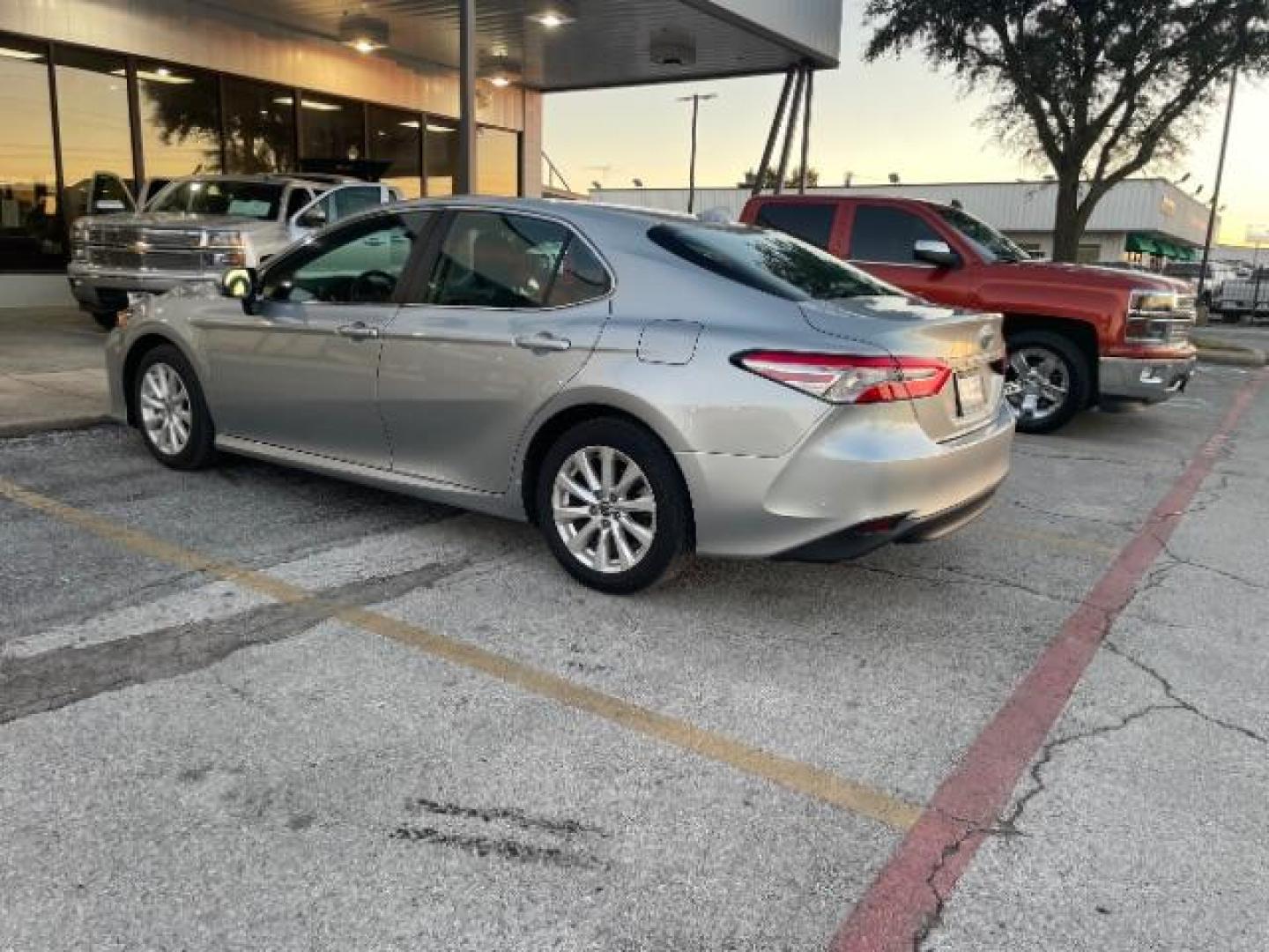 2020 Silver Toyota Camry LE (4T1L11AK5LU) with an 2.5L L4 DOHC 16V engine, 8-Speed Automatic transmission, located at 12182 Garland Rd, Dallas, TX, 75218, (214) 521-2040, 0.000000, 0.000000 - Photo#4