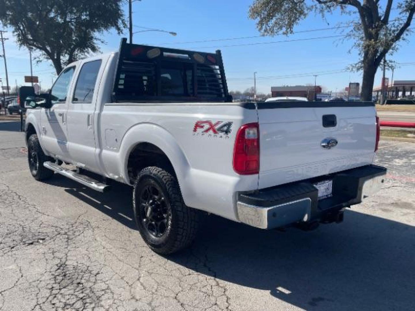 2016 WHITE Ford F-250 SD Lariat Crew Cab 4WD (1FT7W2BT2GE) with an 6.7L V8 OHV 16V DIESEL engine, 6-Speed Automatic transmission, located at 12182 Garland Rd, Dallas, TX, 75218, (214) 521-2040, 0.000000, 0.000000 - Photo#6