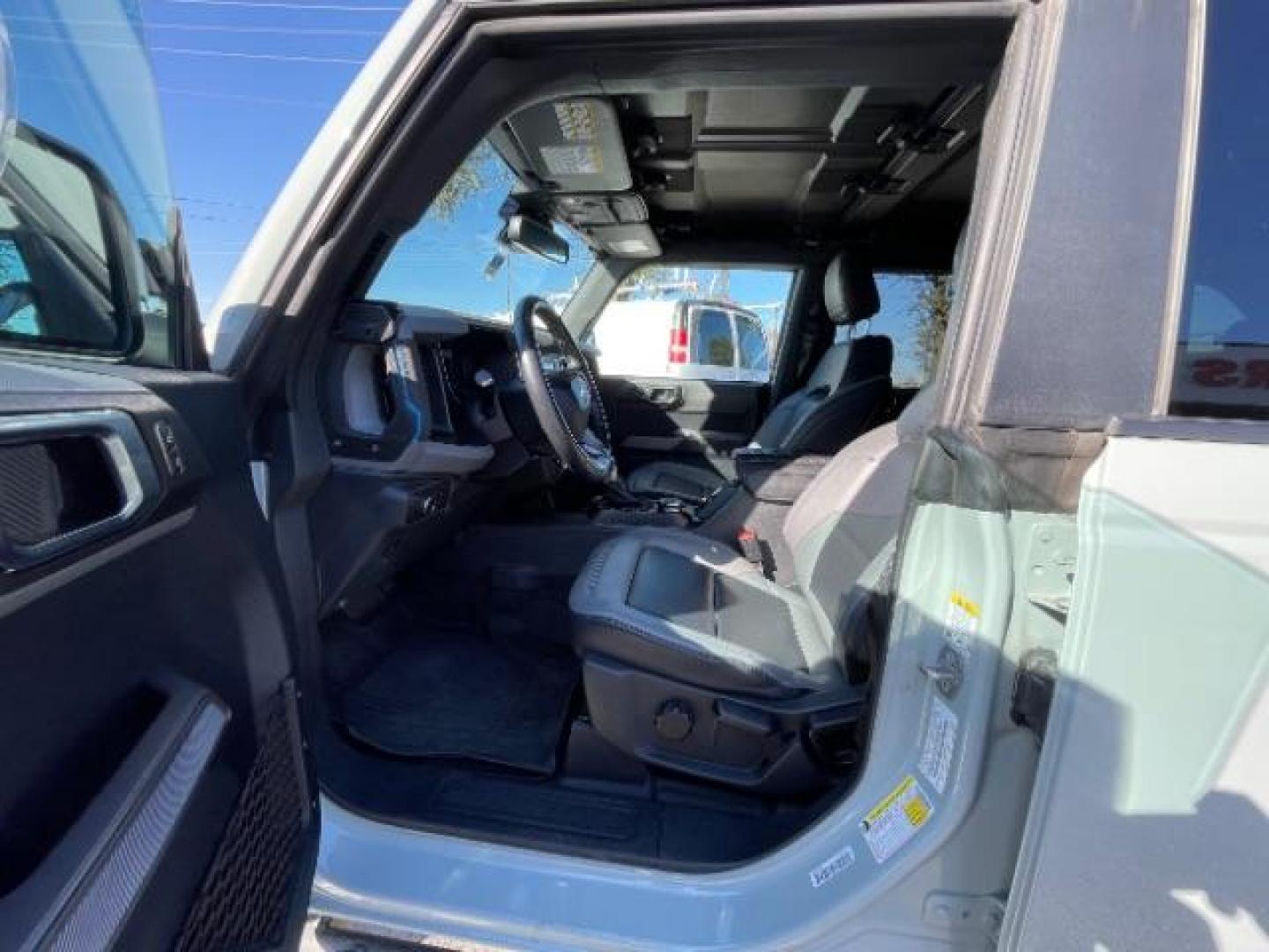 2022 Carbonized Gray Metallic Ford Bronco Black Diamond 4-Door w/Advanced (1FMEE5DP2NL) with an 2.7L V6 DOHC 24V engine, 7-Speed Manual transmission, located at 12182 Garland Rd, Dallas, TX, 75218, (214) 521-2040, 0.000000, 0.000000 - Photo#13