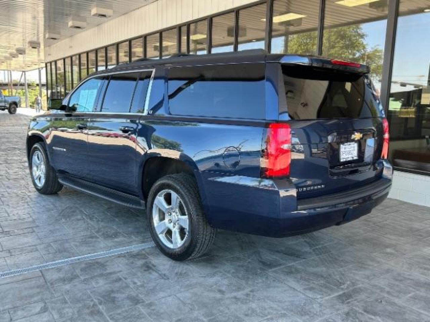 2017 Blue Velvet Metallic Chevrolet Suburban LT (1GNSCHKC9HR) with an EcoTec3 5.3L V-8 gasoline direct injection engine, located at 12182 Garland Rd, Dallas, TX, 75218, (214) 521-2040, 0.000000, 0.000000 - Photo#4